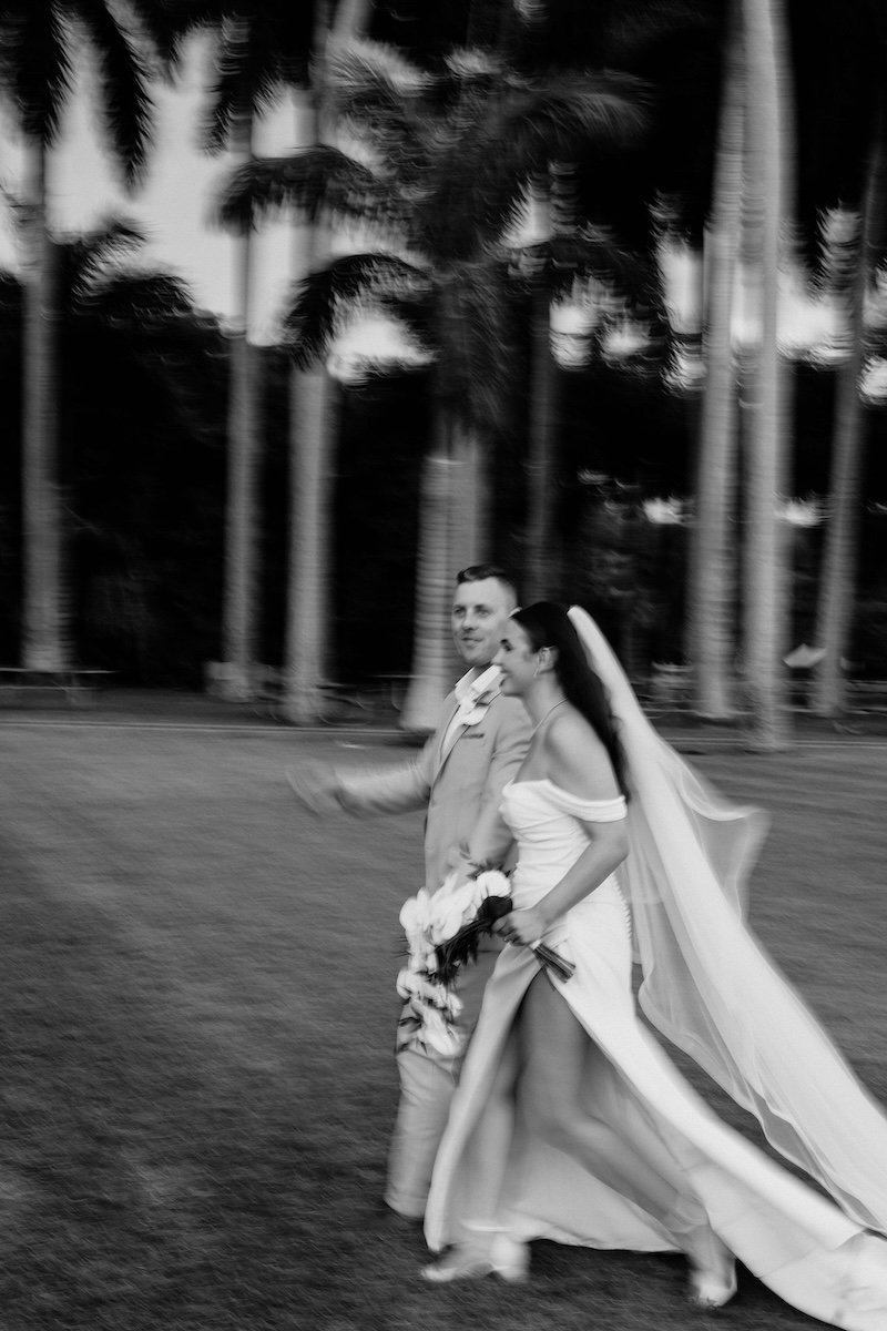 Black and white film shot at historic property, Deeering Estate, Miami, FL for wedding of Lauren & Peter with palm tree backdrop
